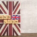 Mot English on Book with United Kingdom Flag, Learning English Language Cours Concept.